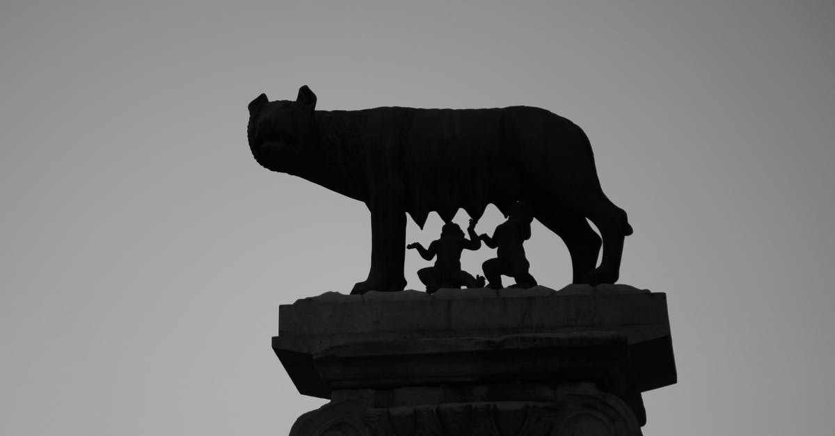 Travel to Italy from the UK - Ancient sculpture of mythical Romulus and Remus