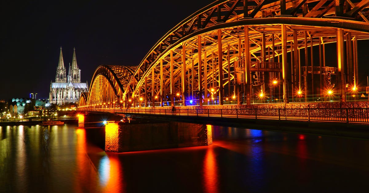 Travel to Portugal from Cologne, Germany [closed] - Lighted Bridge and View of Church at Nighttime