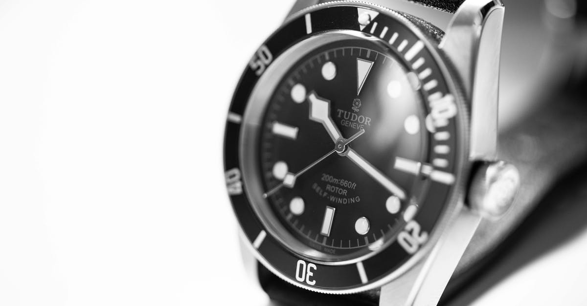 Traveling abroad with an expensive watch - Grayscale Photography of Tudor Analog Watch