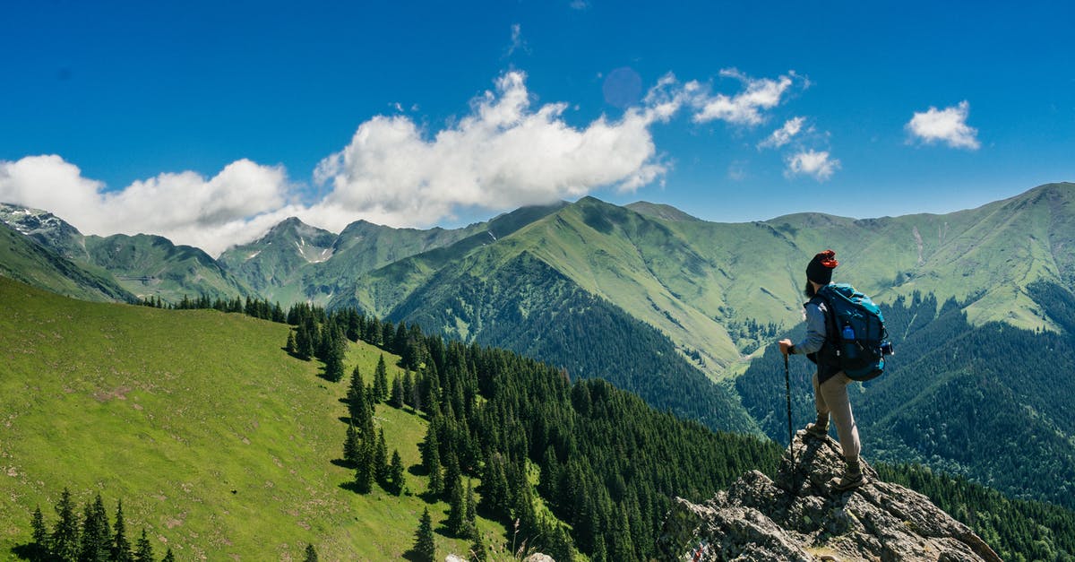 Traveling abroad with high end cryptography devices and software - Man Standing on a Rock