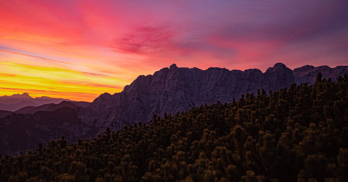 Traveling from Portoroz, Slovenia to Ljubljana airport on Sunday morning - Green Trees Near Mountain during Sunset Traveling from Portoroz, Slovenia to Ljubljana airport on Sunday morning - Green Trees Near Mountain during Sunset
