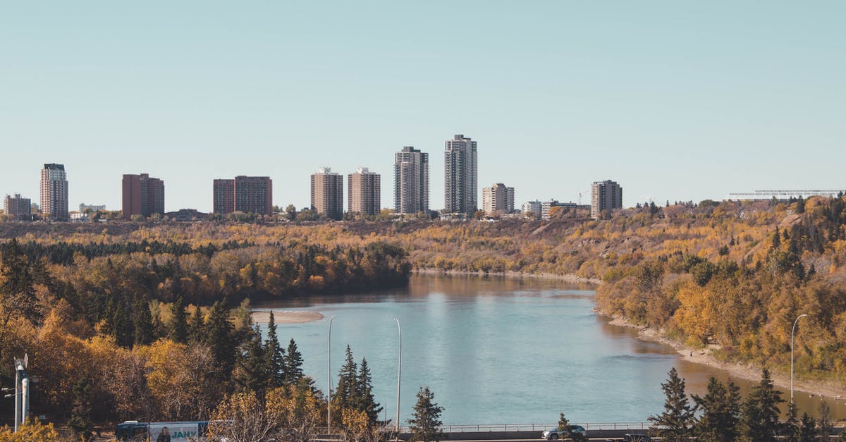 Traveling from Salt Lake City to Denver in late Autumn - Autumn Landscape with Skyscprapers and Lake