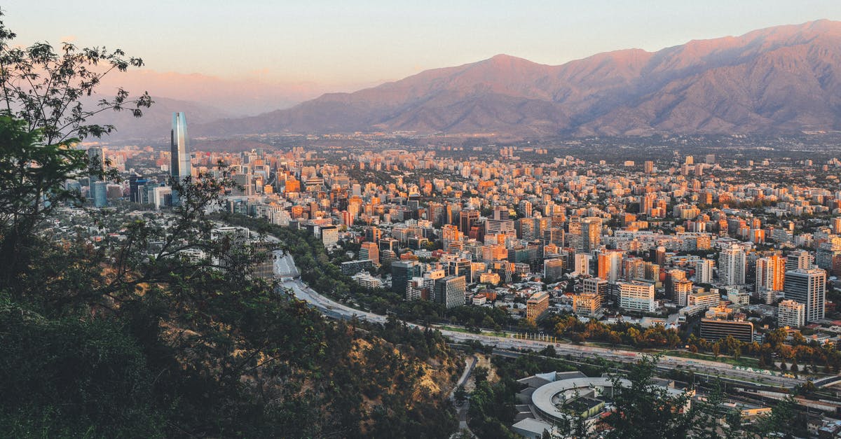 Traveling to Chile without knowing Spanish? - Aerial Photography of City Near Mountain