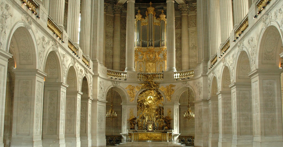 Traveling to France with my maiden name on my passport - Gold and White Concrete Building