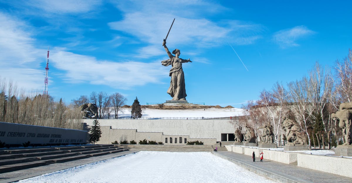 Traveling to Russia as an english speaker - White Concrete Statue Under Blue Sky