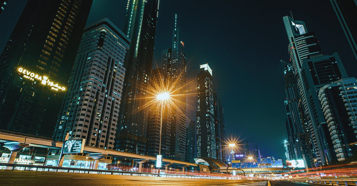 Traveling via Dubai without Visa [duplicate] - Time Lapse Photography of City Buildings during Night Time