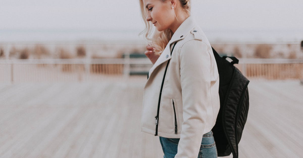 Traveling with BlackDiamond Jetforce avalanche rescue backpack - Woman in Black Zip-up Jacket With Black Backpack