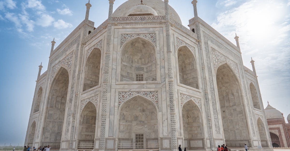 Travelling before entering India with UK visa - People Walking Near Brown Concrete Building