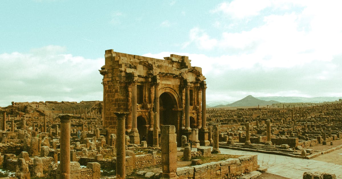 Travelling Roman Roads - Ancient stone building near ruins of antique city