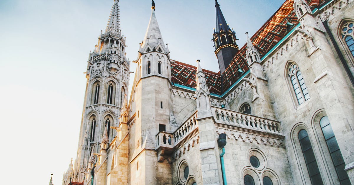 Travelling to Hungary with a valid 'Carta di soggiorno' - Lighted Brown Concrete Building