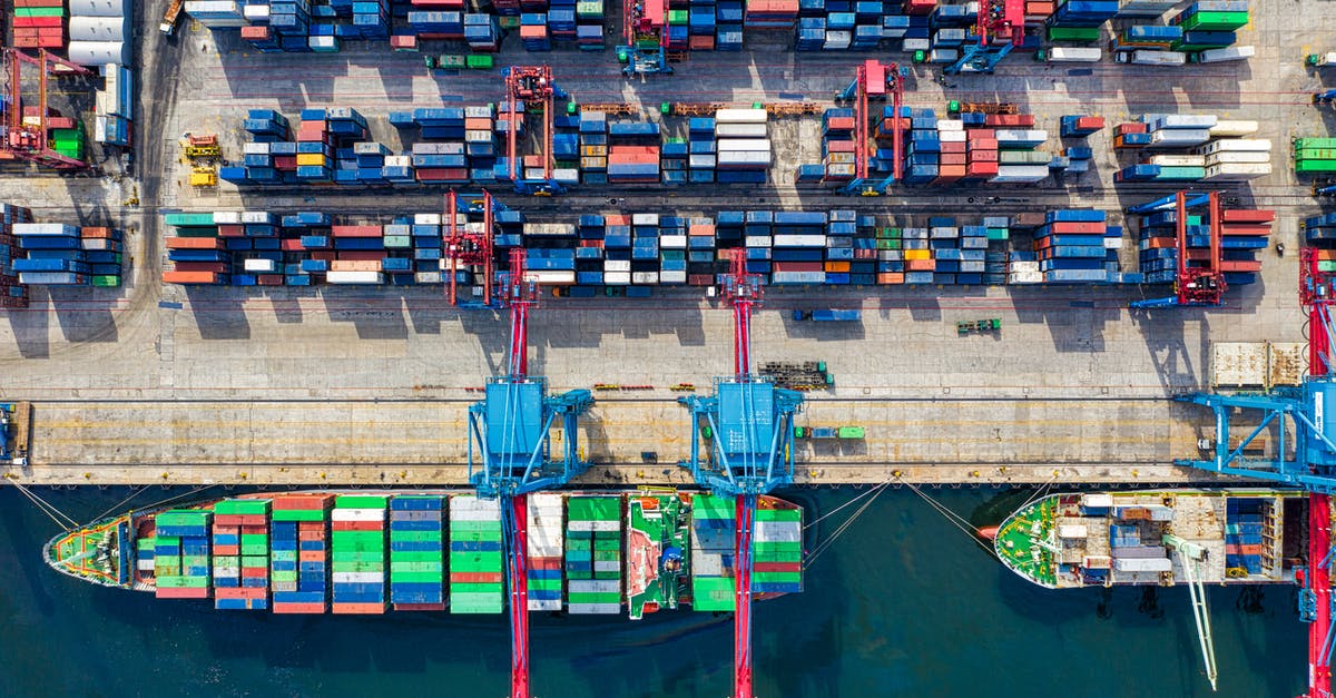 Travelling to India from China - Limit on Customs? [duplicate] - Birds-eye View Photo of Freight Containers