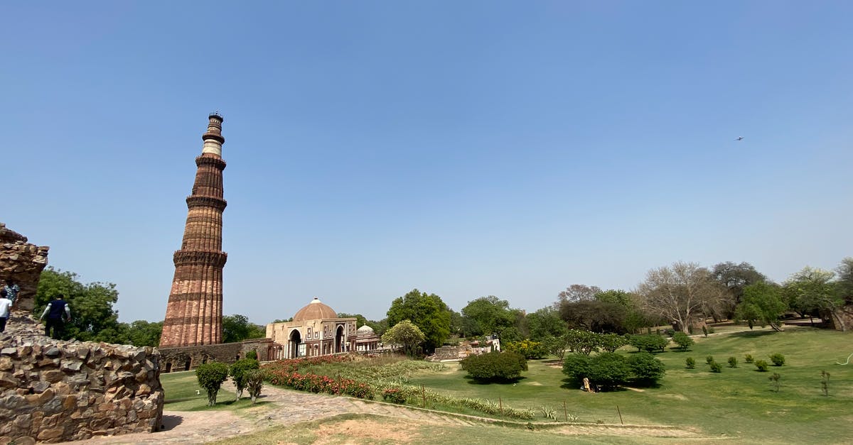 Travelling to India question regarding sim card [duplicate] - Brown Concrete Tower on the Grass Field