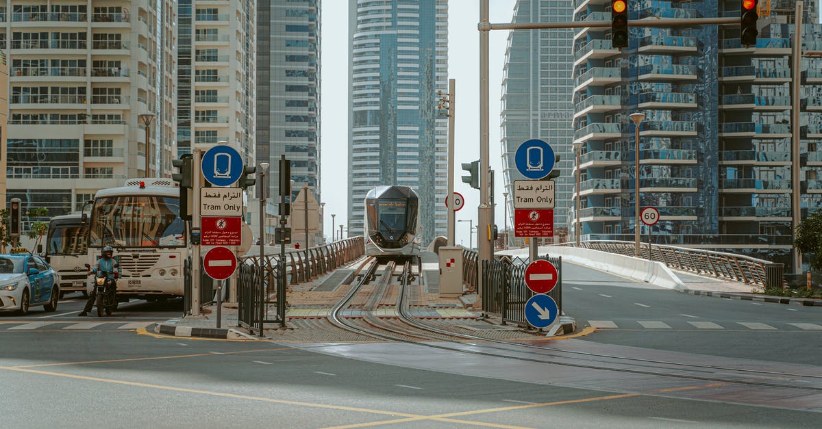 Travelling to Oman by Bus from Dubai - City Roads Near High Rise Buildings