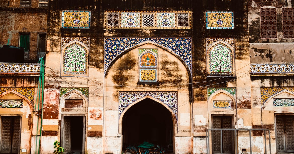 Travelling to Pakistan with expired NICOP - Facade Of An Old Building Designed With Colorful Mosaic Tiles