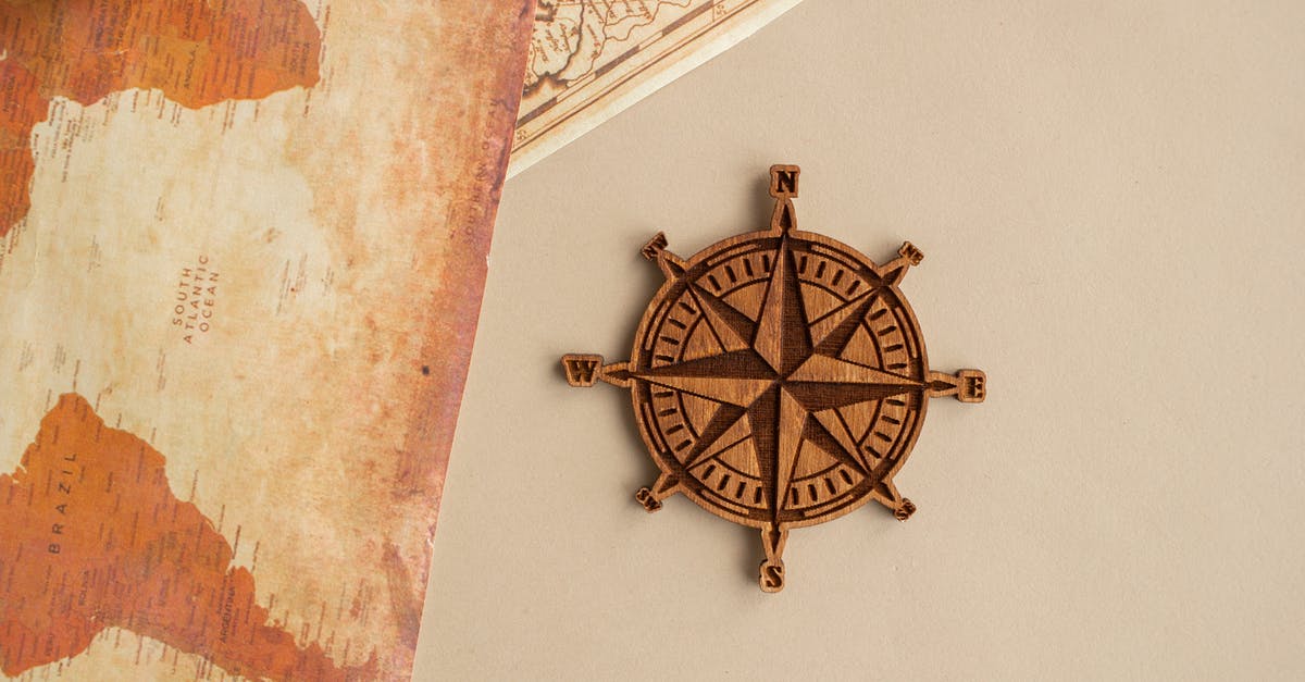 Travelling to Schengen countries frequently - Wind rose with maps on table