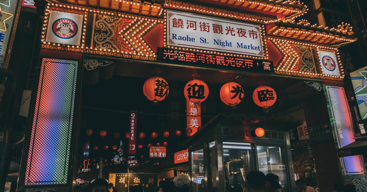 Travelling to Taiwan in September/October - People Walking on Street during Nighttime