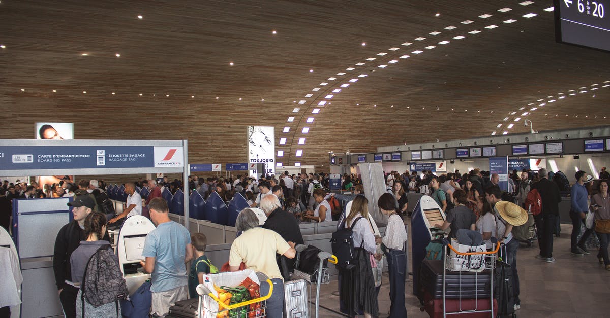 Travelling to Tunisia from Manchester airport connecting in Frankfurt - Photo of People in Airport