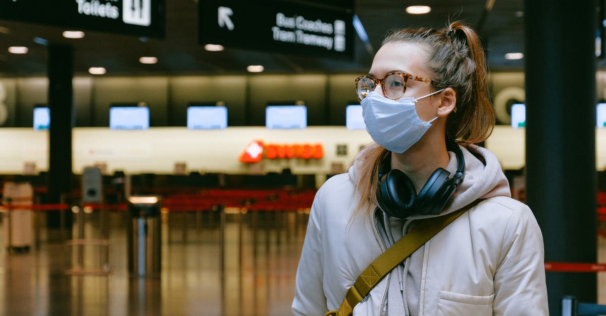 Travelling via Athens Airport to Vienna - Woman Wearing Face Mask