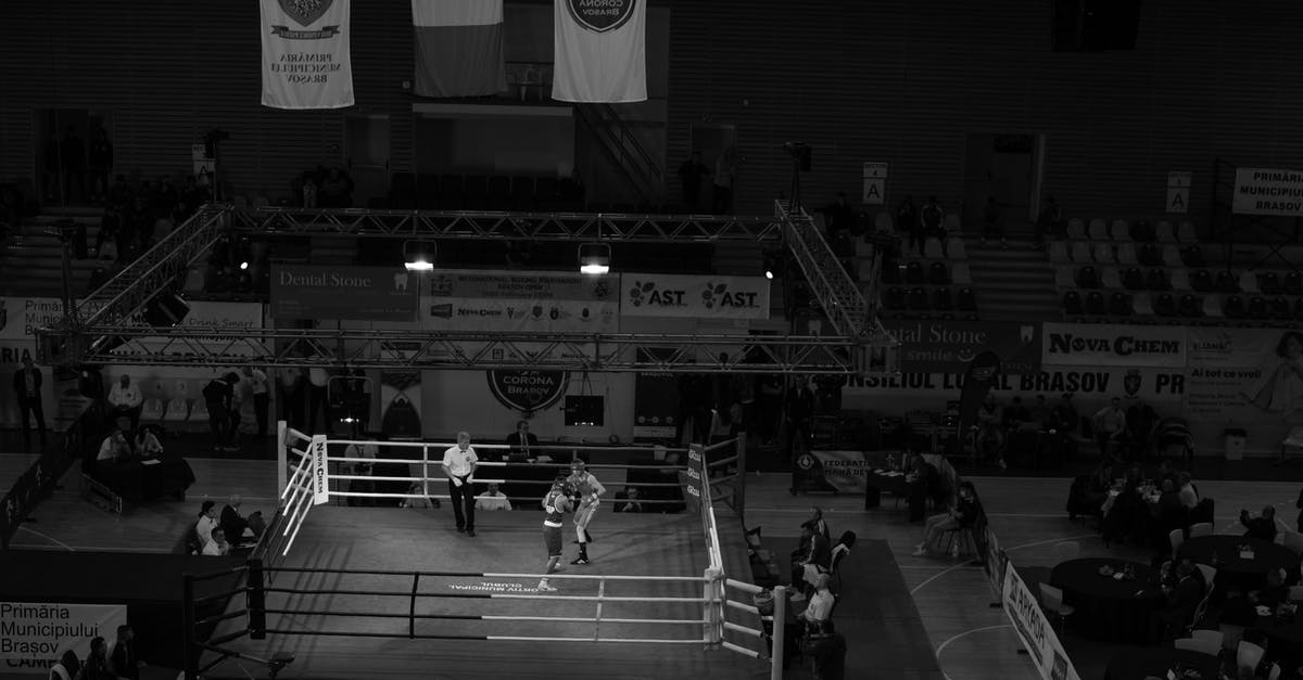 U1256 LONDN TO BESCOT STADIUM [duplicate] - Grayscale Photo of a Boxing Tournament 