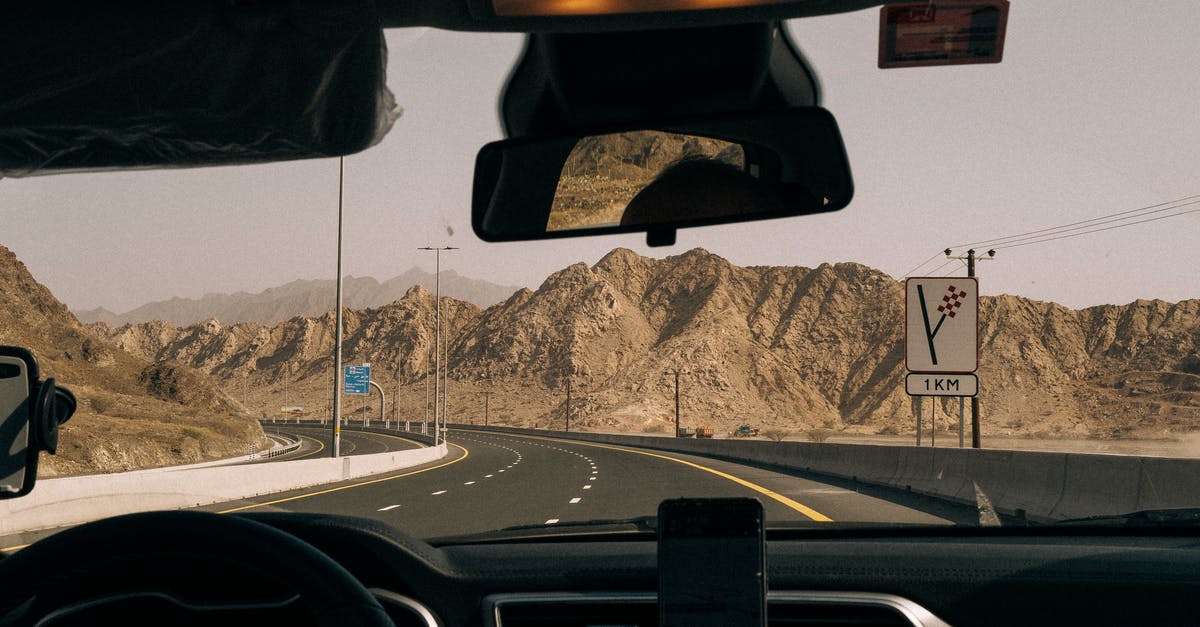 UAE e-visa (pink visa) [duplicate] - View from Inside the Car on Hajar Mountains in United Arab Emirates