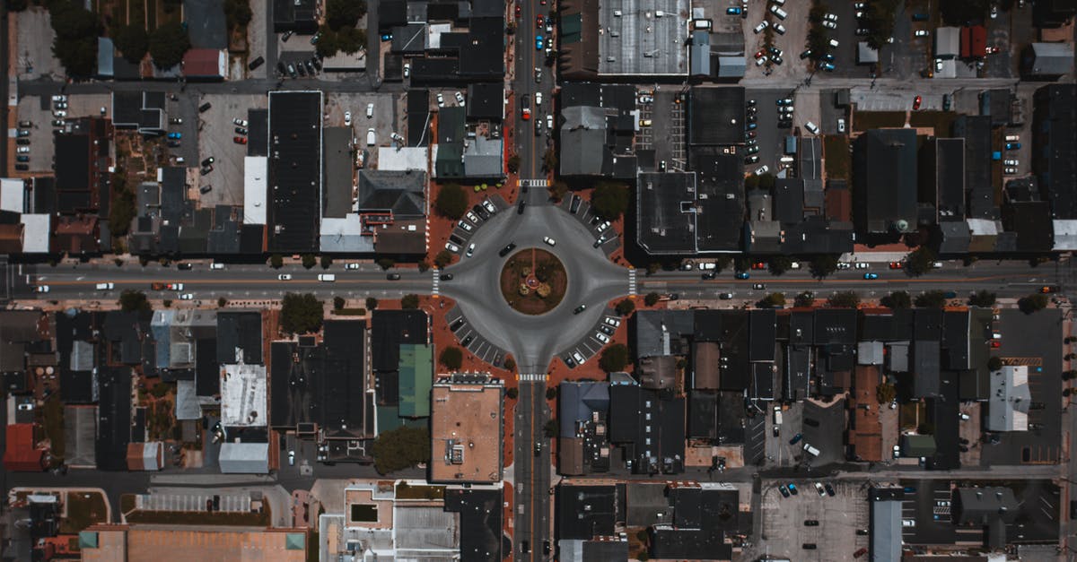 UK DATV visa for round trip - Cityscape with circle junction and roads between buildings