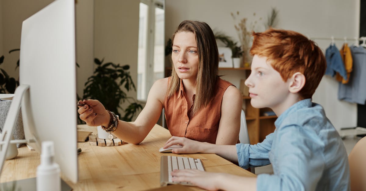 UK extended family visa question - Photo Of Woman Tutoring Young Boy