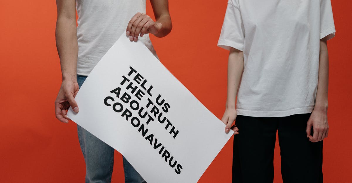 UK Public Health Passenger Locator Form: Privacy and Data Retention Period - People Holding A Poster Asking About The Truth In Coronavirus