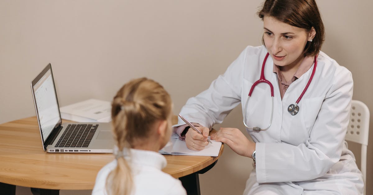 UK Standard Vistor Visa Clarifications - Filling form for my wife and two children - Woman in White Lab Coat Listening to a Girl and Writing Down Notes UK Standard Vistor Visa Clarifications - Filling form for my wife and two children - Woman in White Lab Coat Listening to a Girl and Writing Down Notes