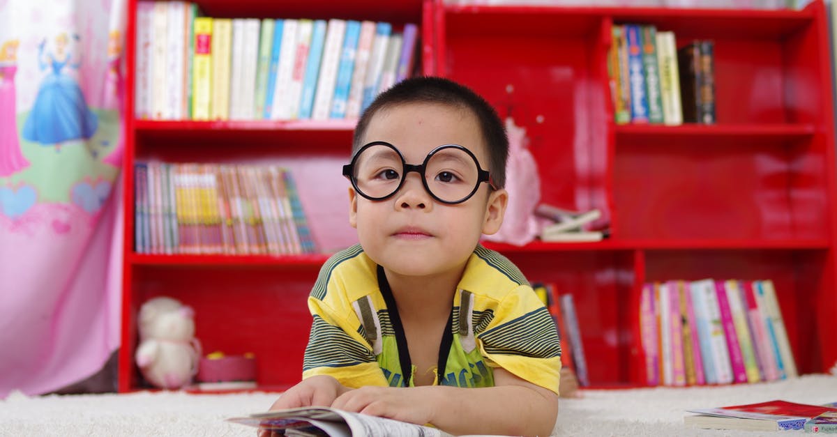 UK Tier 4 student visa [closed] - Boy Standing Near Bookshelf