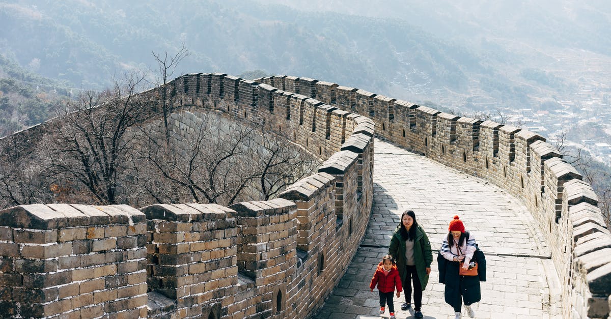 UK visa: transit versus visitor question - People Walking on Great Wall of China 