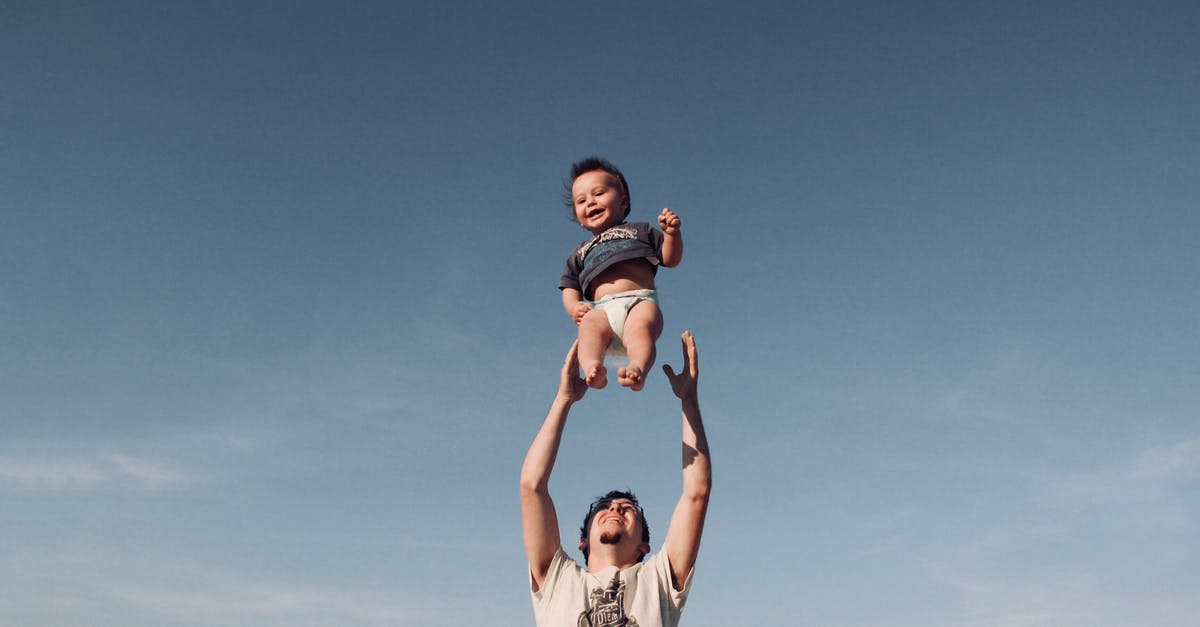 UK visitor's visa refused for my dad who is retired - Photo of Man in Raising Baby Under Blue Sky UK visitor's visa refused for my dad who is retired - Photo of Man in Raising Baby Under Blue Sky