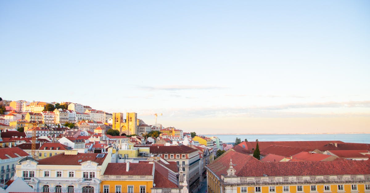 Urban exploration in Lisbon area, Portugal - Lisbon residential district roofs in twilight