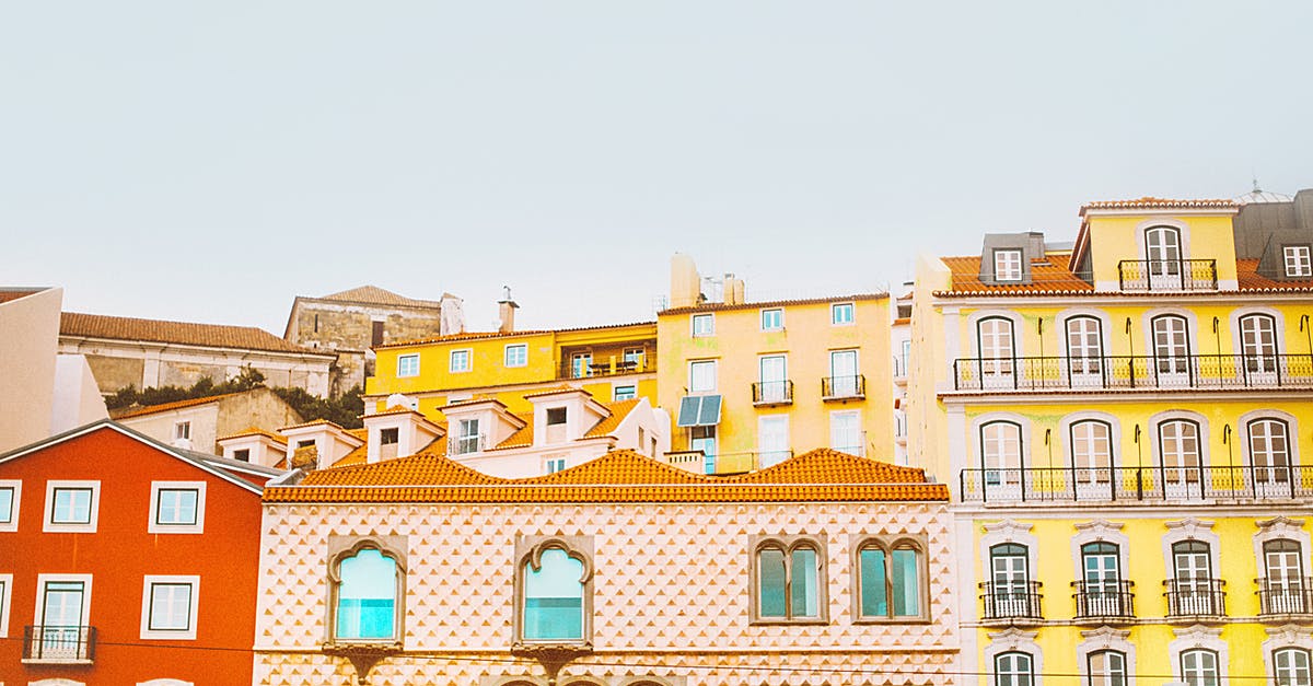 Urban exploration in Lisbon area, Portugal - Photograph of Several Assorted-color Concrete Structures