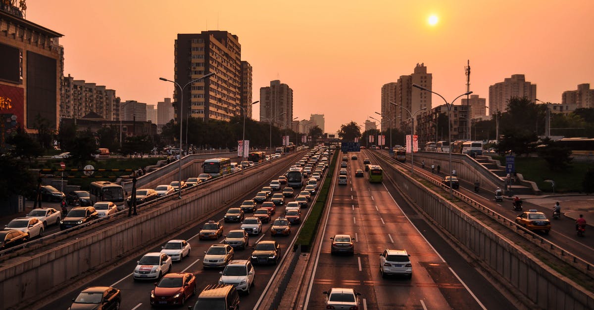 US Driving - pulling onto a busy highway using on/off ramp - Vehicle in Road at Golden Hour