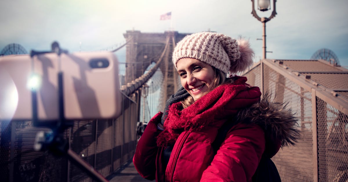 USA to Canada: passport on iPhone but not with me - Woman Wearing Red Zip-up Hooded Jacket