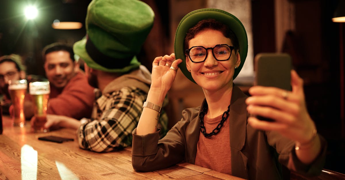 Using my Azerbaijan driver's license in the Netherlands? - Woman in Brown Long Sleeve Shirt Wearing Green Hat