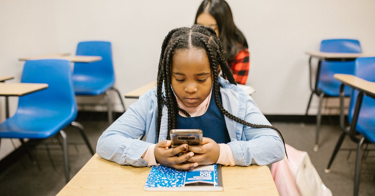 Using tourist visa after student visa ends? - Girl Sitting on Her Desk While Using Her Smartphone