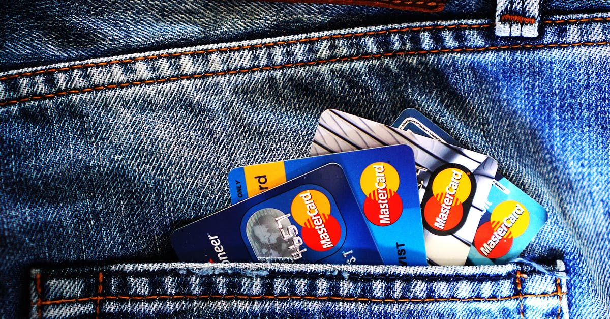 Uzbekistan ATMs and Mastercard - Blue Master Card on Denim Pocket