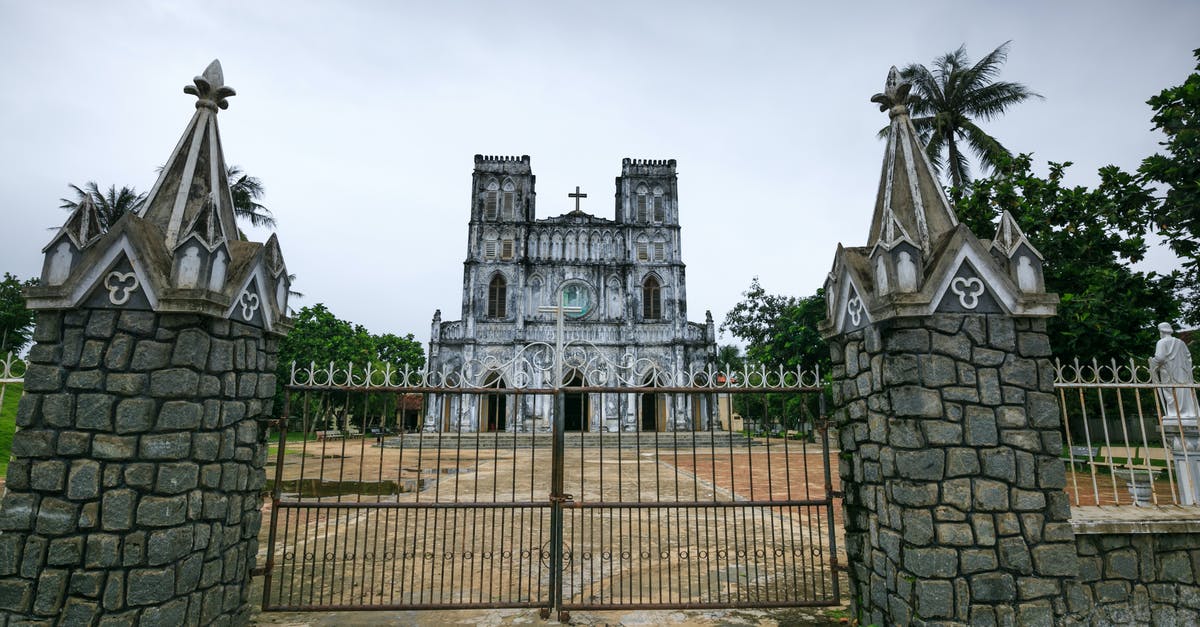 Vietnam visa for UK citizen - Grey Concrete Building Under White Sky