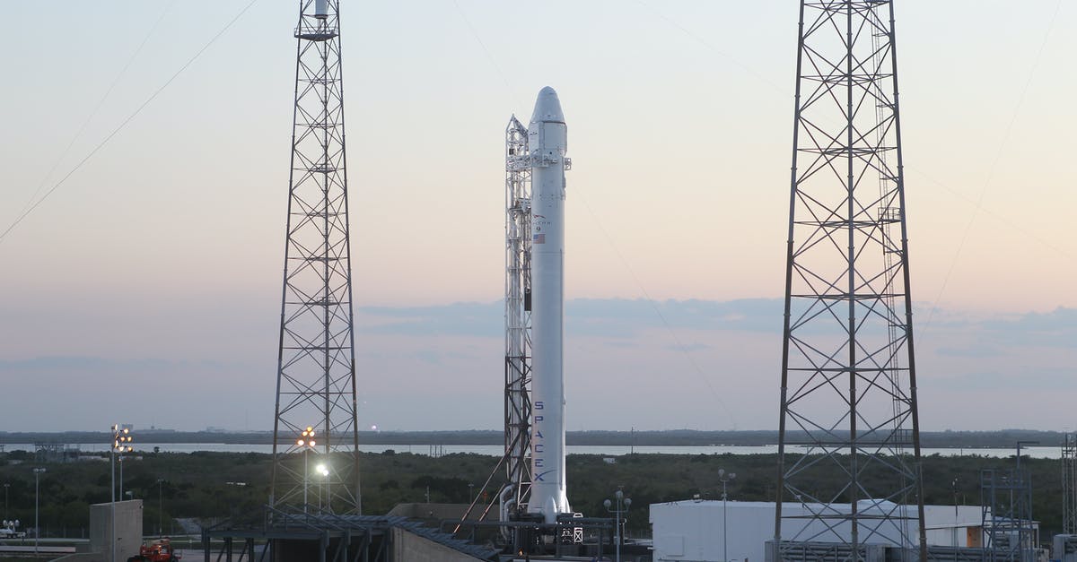 Viewing a Soyuz launch on the cheap? - Space rocket installed on metal construction in spaceport and ready for launching against cloudless sky