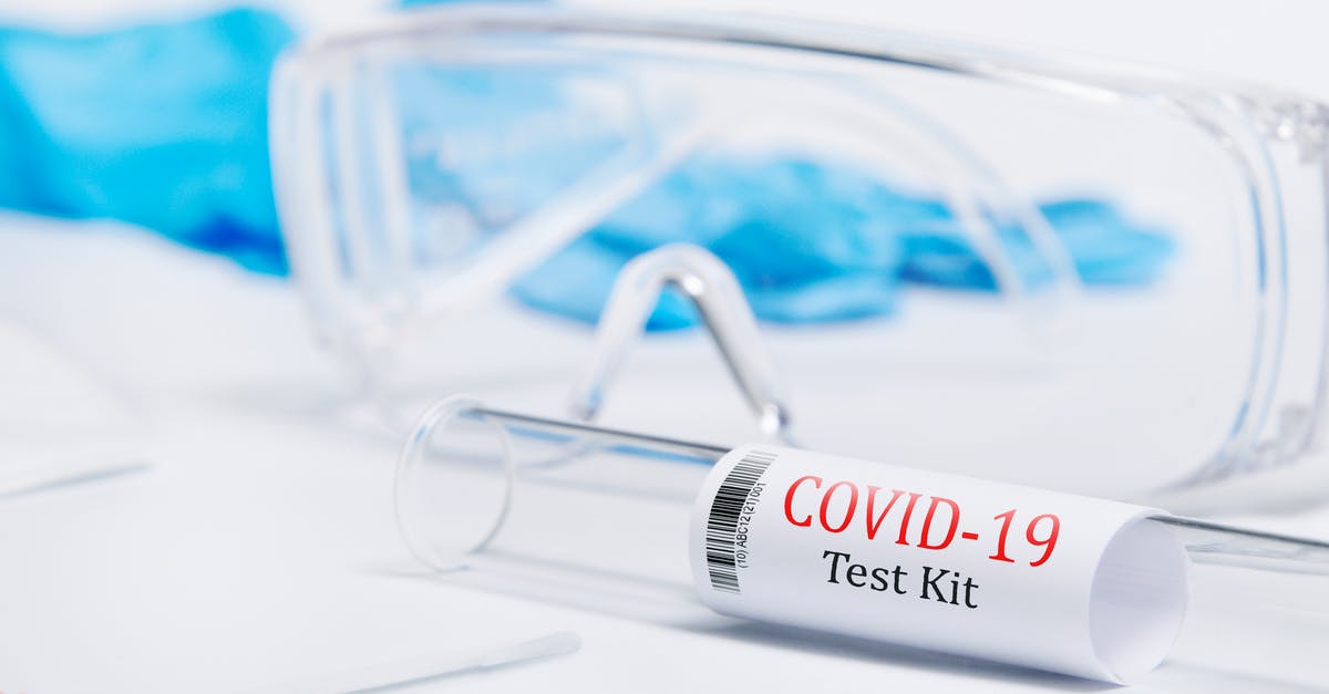 Virgin Atlantic - Approved COVID-19 Test Centres - Kit tested Covid-19 , Coronavirus symptoms medical concept with PPE and Swab PCR test on white background isolated , Glasses, mask, gloves for protection against the virus	