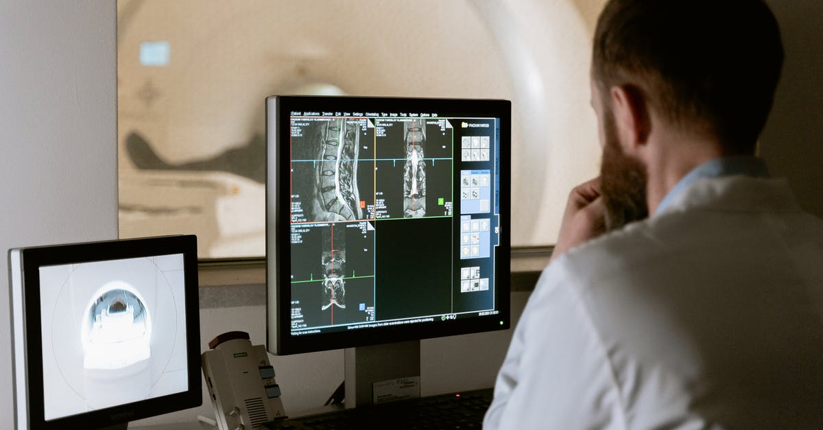 virgin australia 1 PC baggage interpretation - Photo Of Doctor Looking Deeply Unto The Screen 