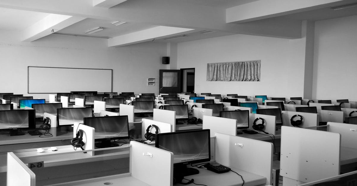 Virtual offices or business centers in Ensenada Mexico? - Gray Wooden Computer Cubicles Inside Room