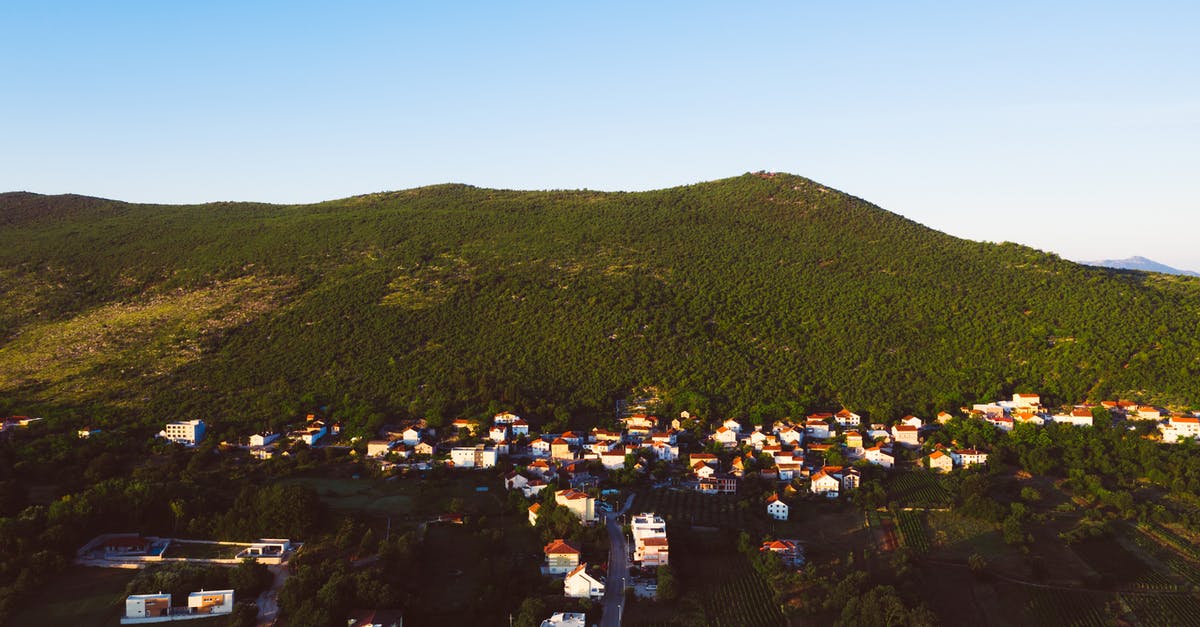 Visa for Romania, Bosnia and Montenegro? - Houses on Mountain Cliff