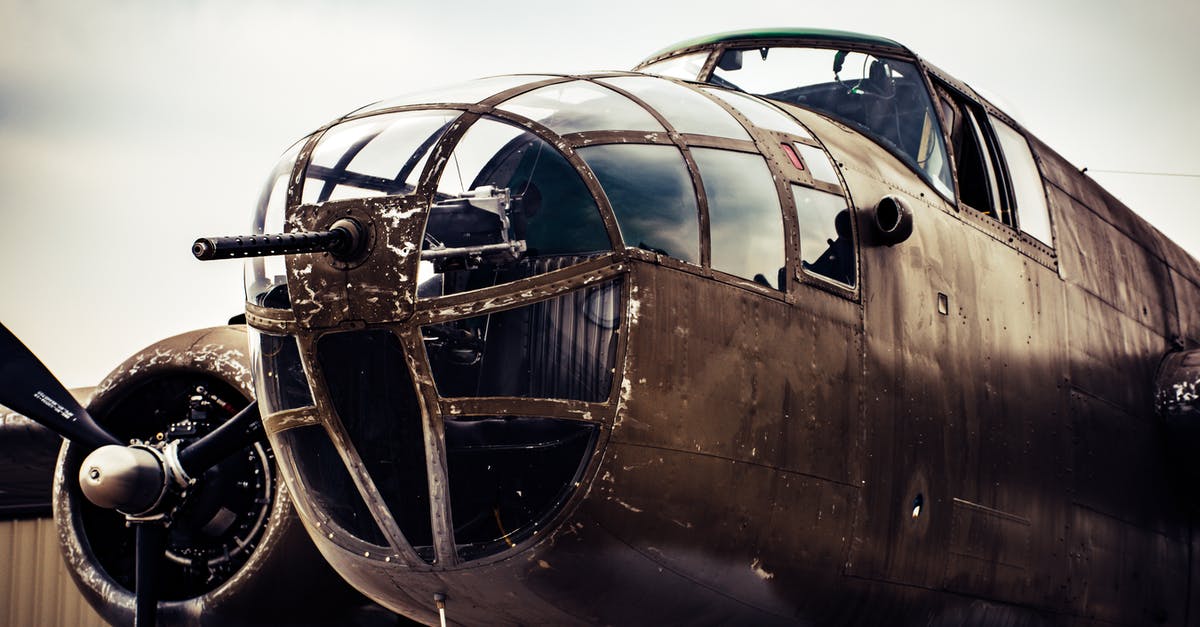 Visa waiver denied at airport [closed] - Closeup Photography of Grey Biplane