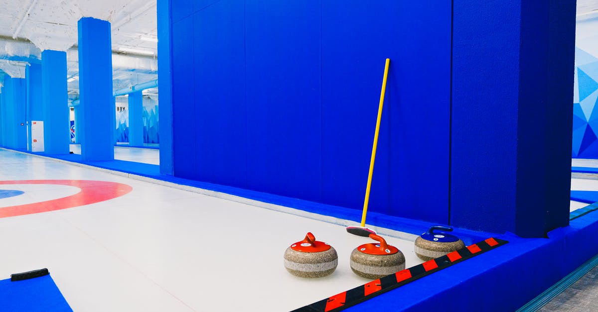 Visa-free stays involving paid activity in the Schengen Area - how do they work? - Curling stones and broom near wall