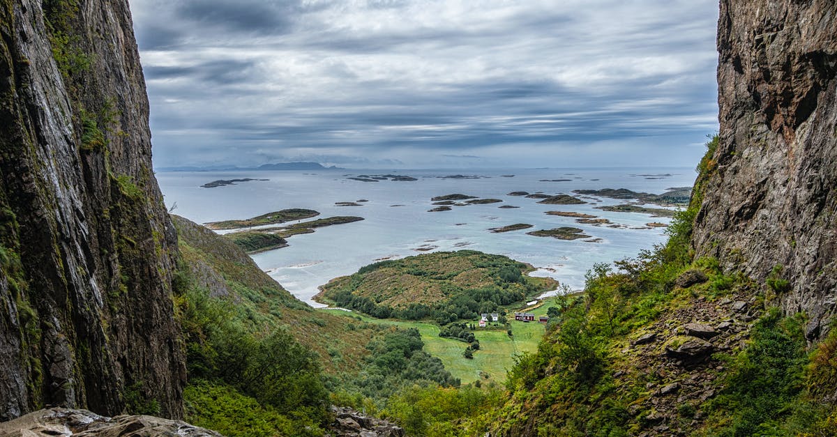 Visit the Norwegian fjords or other attractions when landing in Haugesund - Land Form Between Hills And Ocean Visit the Norwegian fjords or other attractions when landing in Haugesund - Land Form Between Hills And Ocean