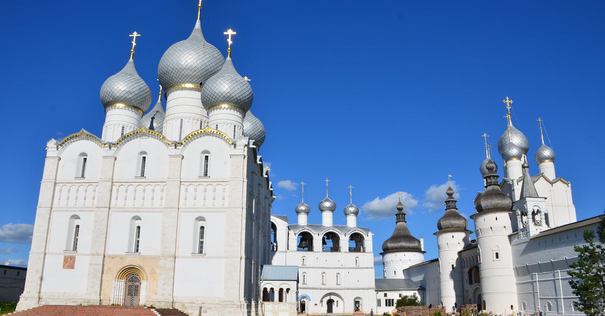 Visiting Russia as an Arab. Am I going to be hassled? - The Dormition Cathedral in Moscow, Russia Under Blue Sky