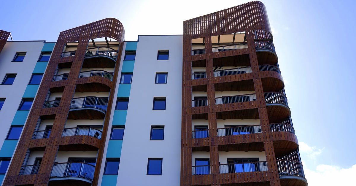 Visiting the housing projects in New York City? - White and Brown Concrete Building