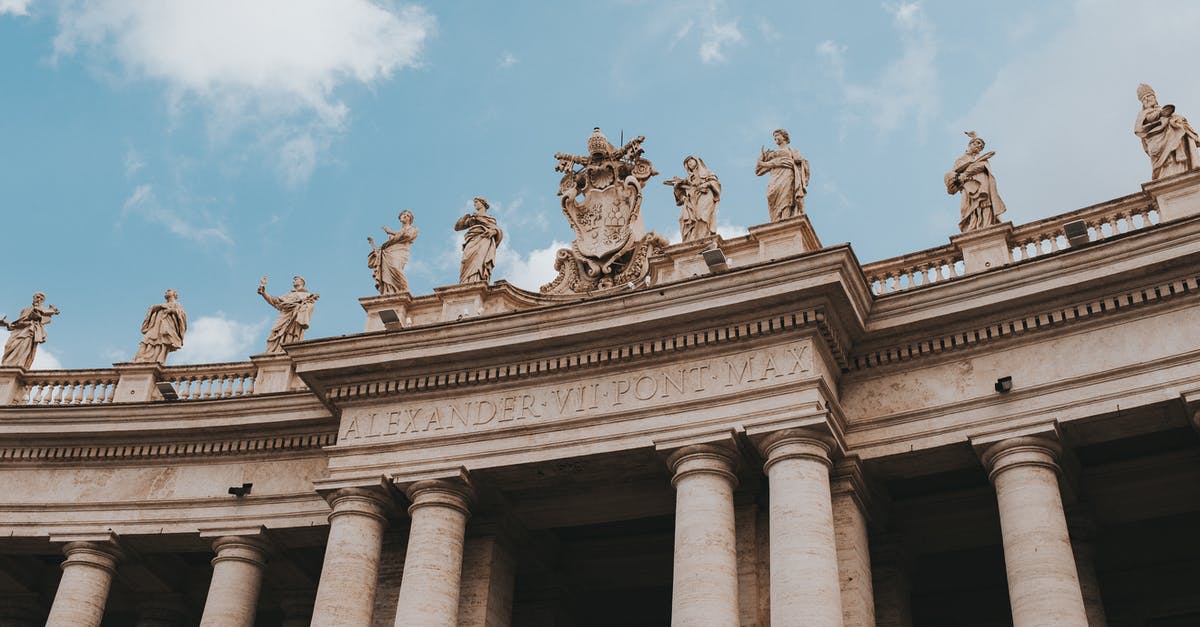 Visiting the Vatican as a pilgrim? - White Concrete Building Under Blue Sky